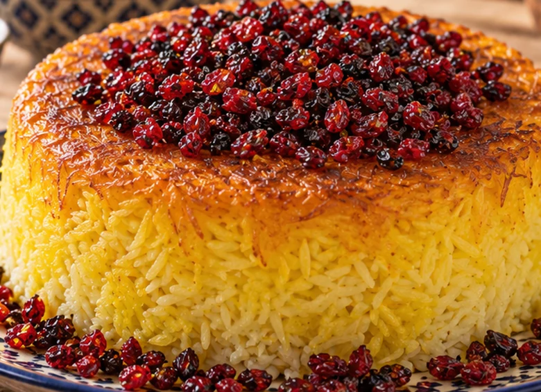 Golden Persian tahdig served with fragrant rice